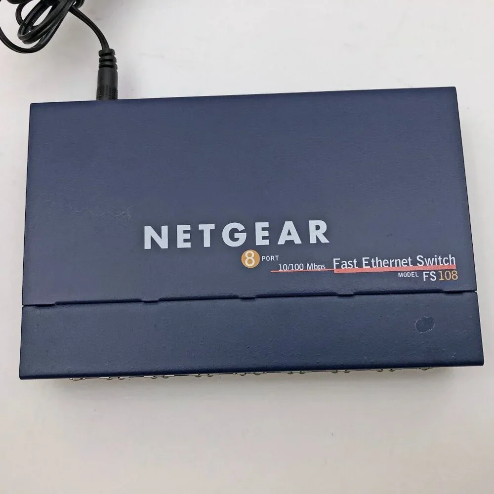 Netgear FS108 8 Port 10/100 Mbps Fast Ethernet Switch w/Power Supply